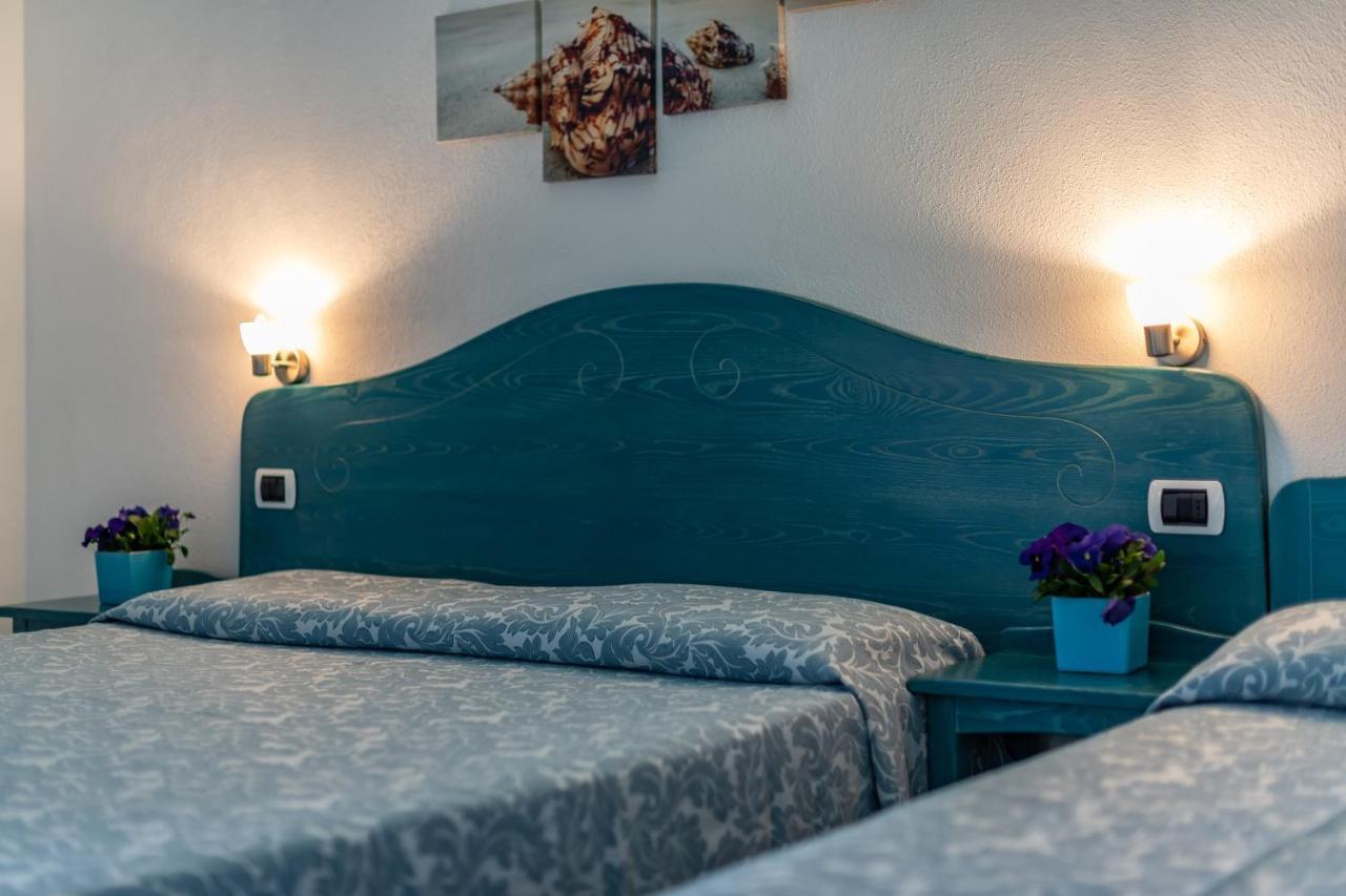 Hotel Quasar Cala Liberotto Extérieur photo