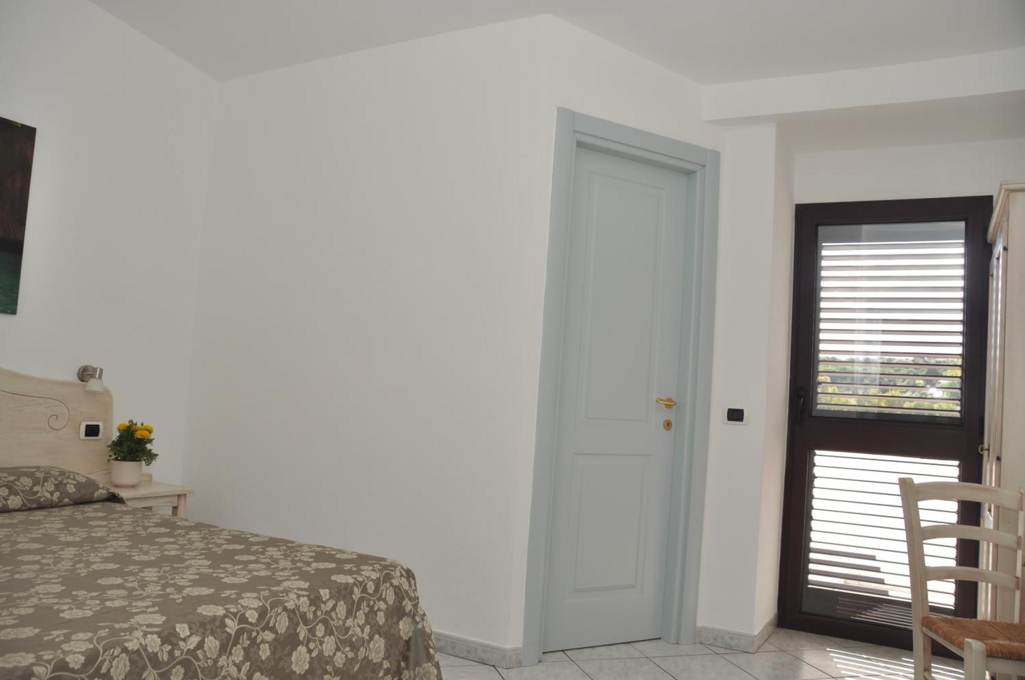 Hotel Quasar Cala Liberotto Extérieur photo